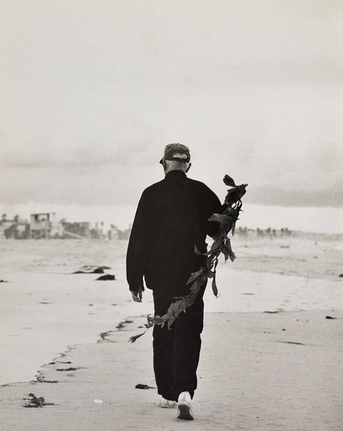 Signed by the artist on the half title, signed by the photographer under the colophon.