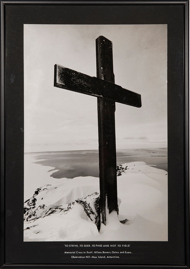 Classic Herbert Ponting photograph from Captain Scott's Terra Nova expedition (1910-1913), showing the memorial cross erected on Ross Island, Antarctica