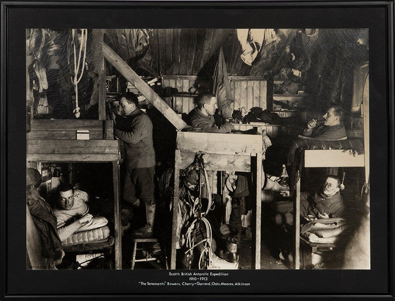 Classic Herbert Ponting photograph from Captain Scott's Terra Nova expedition (1910-1913), showing the Tenements, the officer's bunks in the Hut