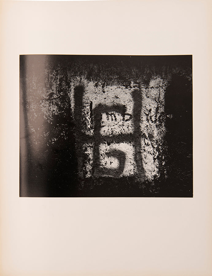 A presentation copy of Aaron Siskind's first monograph, inscribed to antique costumes and textiles dealer Cora Ginsburg.
