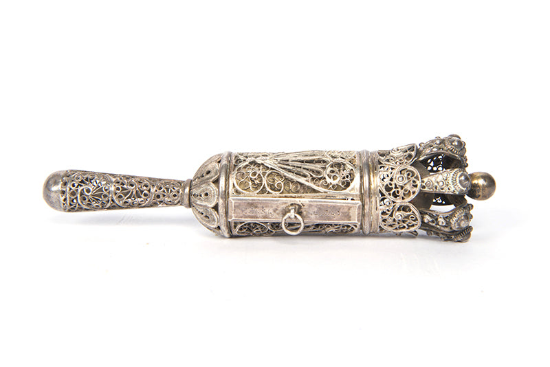 A beautiful example of a small Bezalel Megillat Esther on vellum, housed in a silver case with elaborate filigree and semiprecious stones.