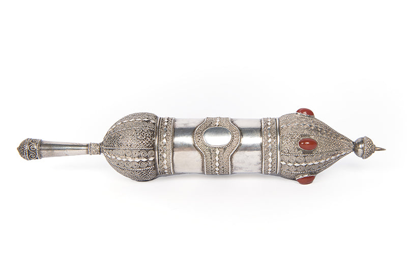 A beautiful example of a Bezalel Megillat Esther on vellum, housed in a silver case with elaborate filigree and semiprecious stones.