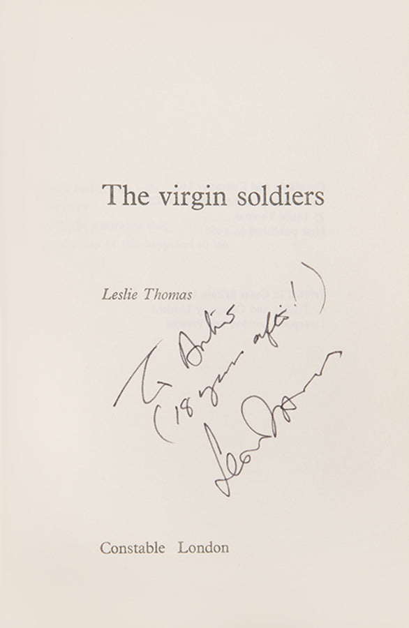 A first edition of Thomas' immensely popular, darkly comic story of British conscripts in the Cold War.