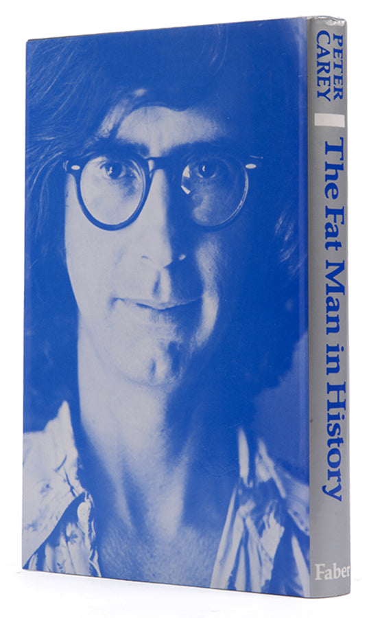 The first English edition, signed and in excellent condition, of Peter Carey's short story collection, The Fat Man in History.