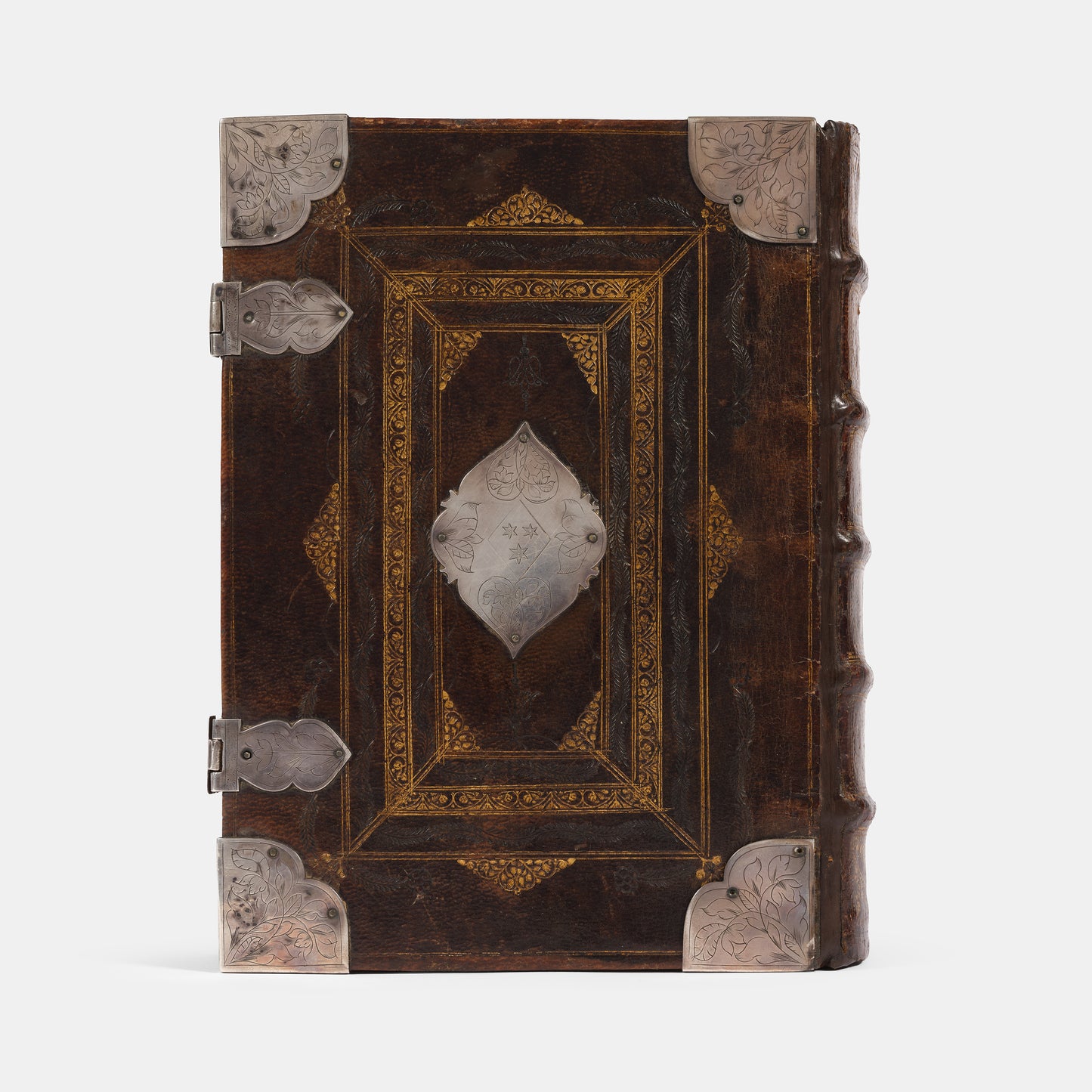 An impressive mid-seventeenth century King James Bible, splendidly preserved in an English Restoration binding of gilt panelled blackmorocco with silver furniture including the original working clasps