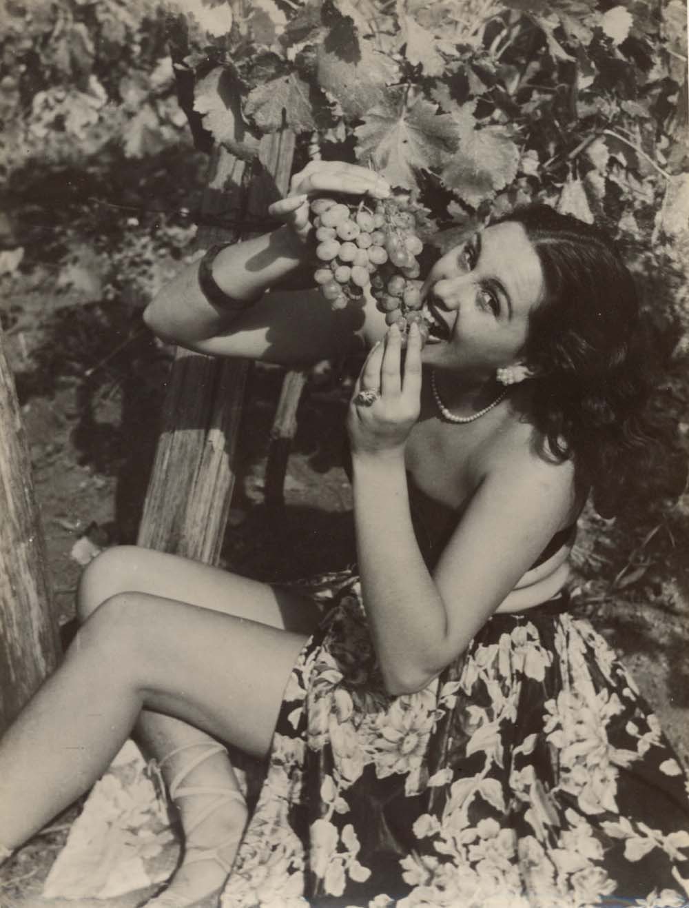 Eating Grapes.