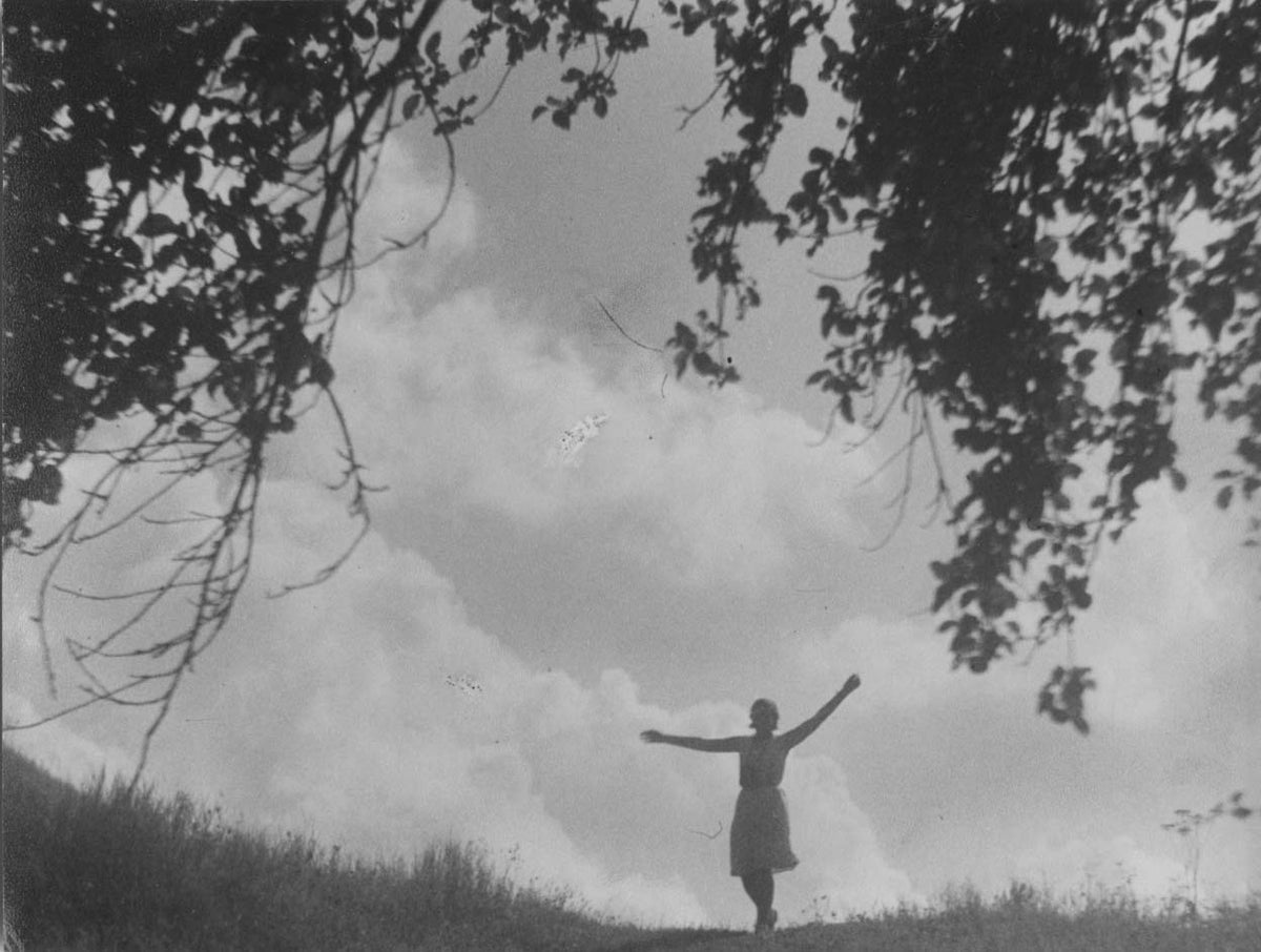 Woman On Top Of A Hill