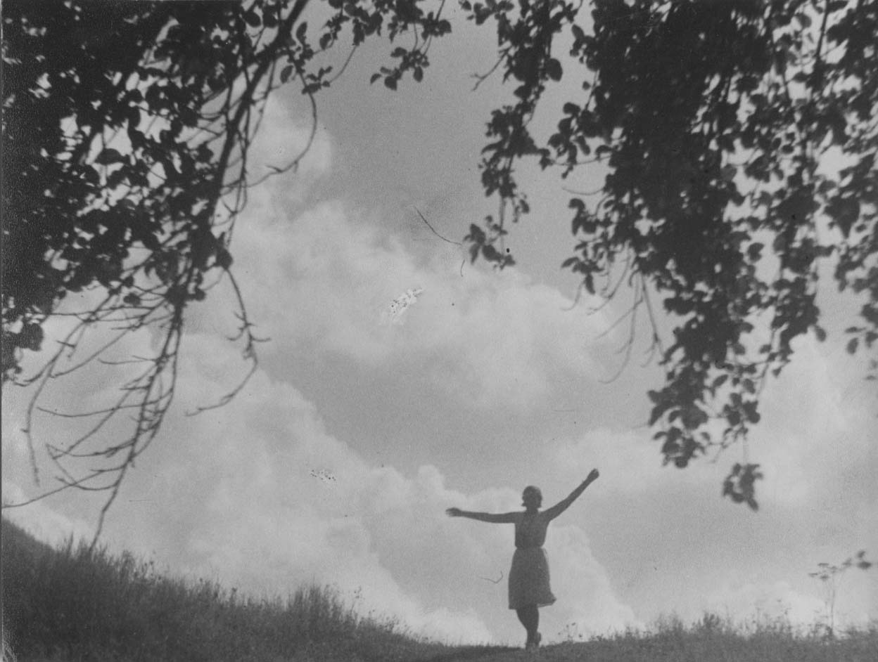 Woman On Top Of A Hill