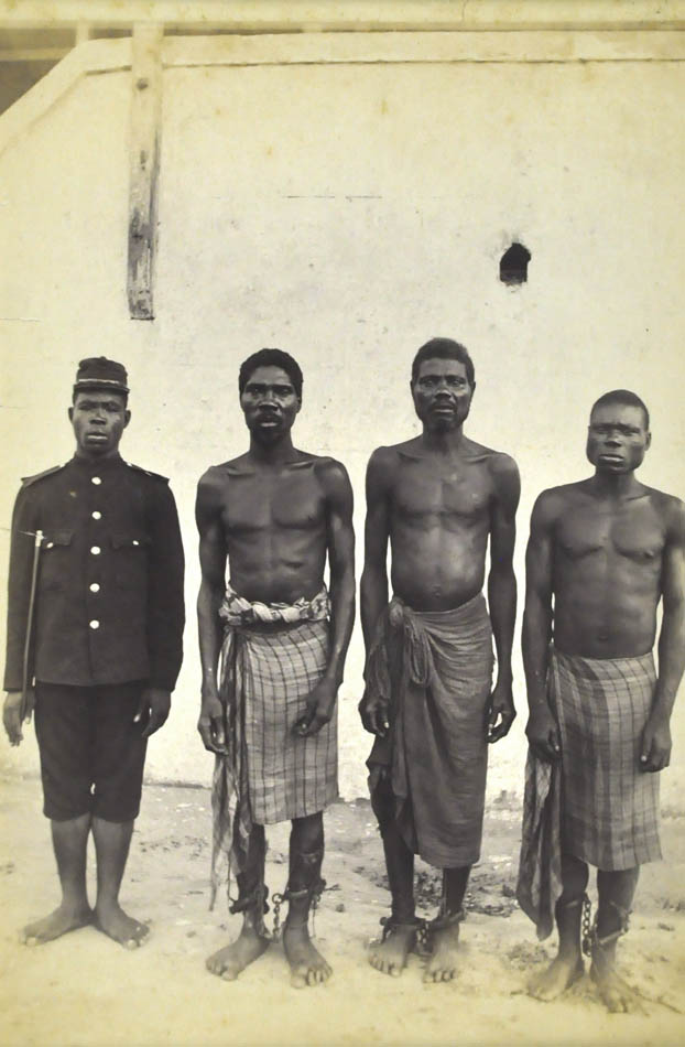 Slaves with soldier, South Africa.