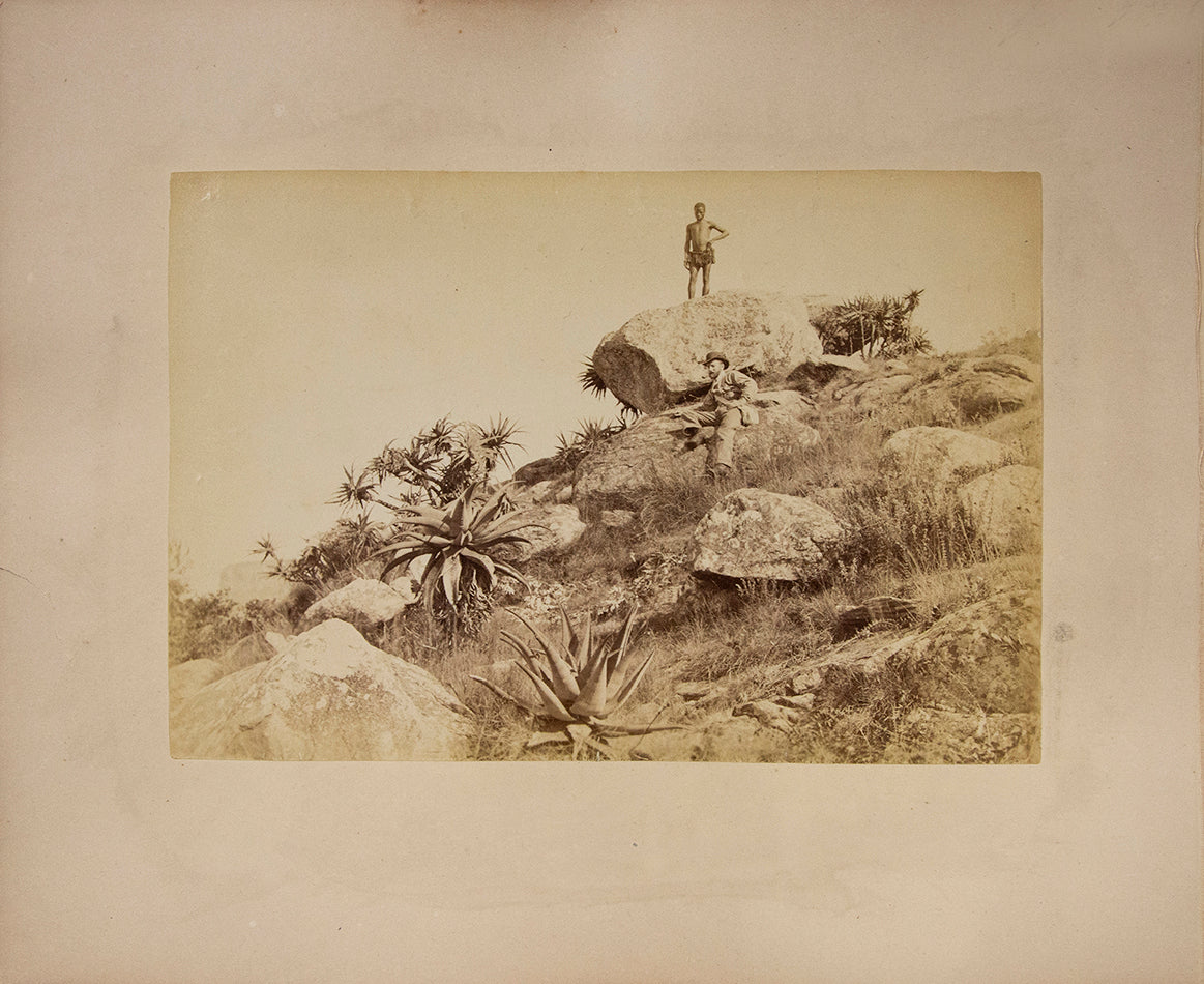 Man on hillside.