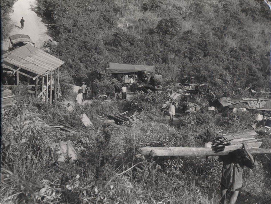 China, Workers Taking Timber up the Slope.