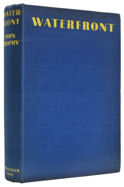An uncommon book in dust jacket, strikingly similar to, and coeval with, Malcolm Lowry's first book Ultramarine. Inscribed to Irish writer Conal O'Riordan.