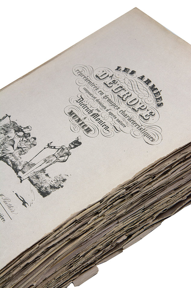 An exceptional example of a remarkable survival. A large collection of 589 plates of Eckert's European military costumes in the original wrappers.
