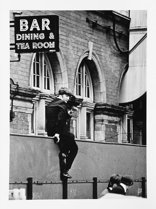 John Lennon at Marylebone Station. London: S H Editions, 5 April 1964, 2021. Original silver gelatin print on Ilford Multigrade fibre base 255 gsm paper