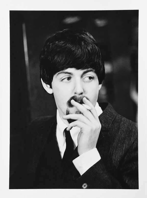 Paul McCartney smoking at Marylebone Station. London: S H Editions, 5 April 1964 / 2021