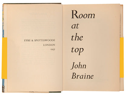 First edition of Room at the Top by John Braine, one of the 'Angry Young Men'. In the original dust jacket designed by John Minton and wraparound.