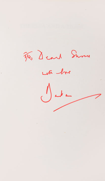 First edition inscribed by the author in red ink on front free endpaper