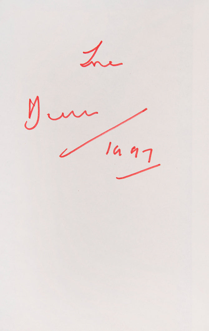 First edition inscribed by the author in red ink on front pastedown, dated 1997.