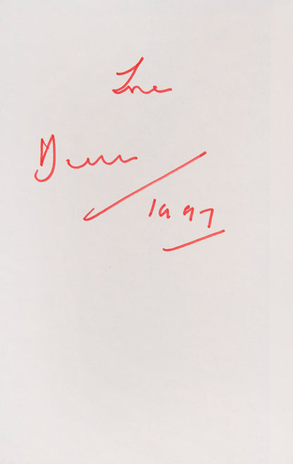 First edition inscribed by the author in red ink on front pastedown, dated 1997.