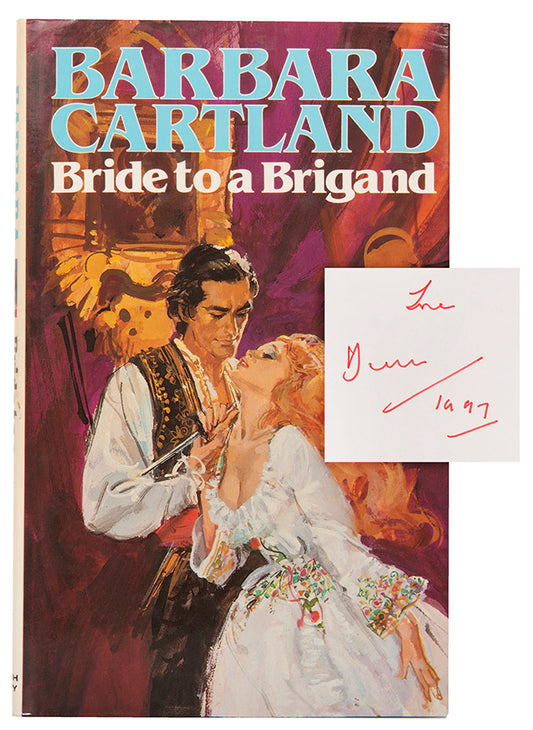 First edition inscribed by the author in red ink on front pastedown, dated 1997.