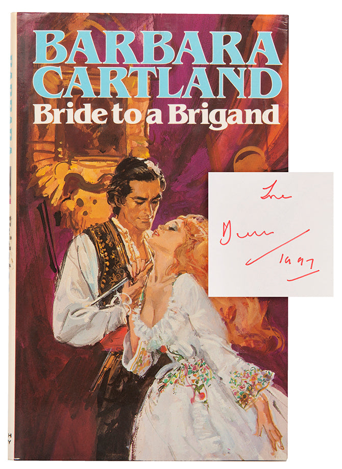 First edition inscribed by the author in red ink on front pastedown, dated 1997.
