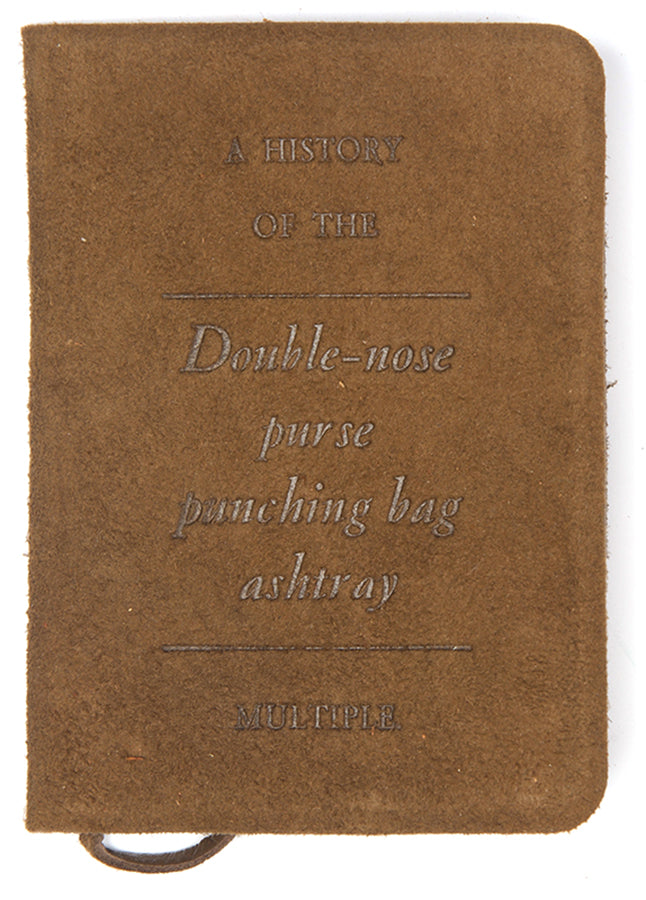 Claes Oldenburg, Double Nose Purse Punching Bag Ashtray 1970, leather, bronze, wood, metal, bark chips, book, signed, from the edition of 75