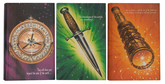 First UK editions of Philip Pullman's acclaimed fantasy trilogy His Dark Materials, signed by the author on the title of The Northern Lights.