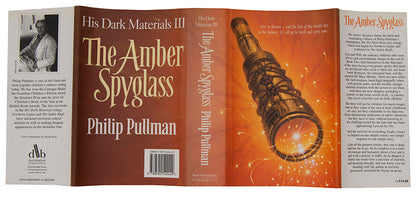 First UK editions of Philip Pullman's acclaimed fantasy trilogy His Dark Materials, signed by the author on the title of The Northern Lights.