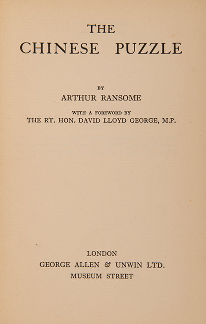 Presentation copy of The Chinese Puzzle by Arthur Ransome, inscribed by the author to his friend, the poet and critic Lascelles Abercrombie.