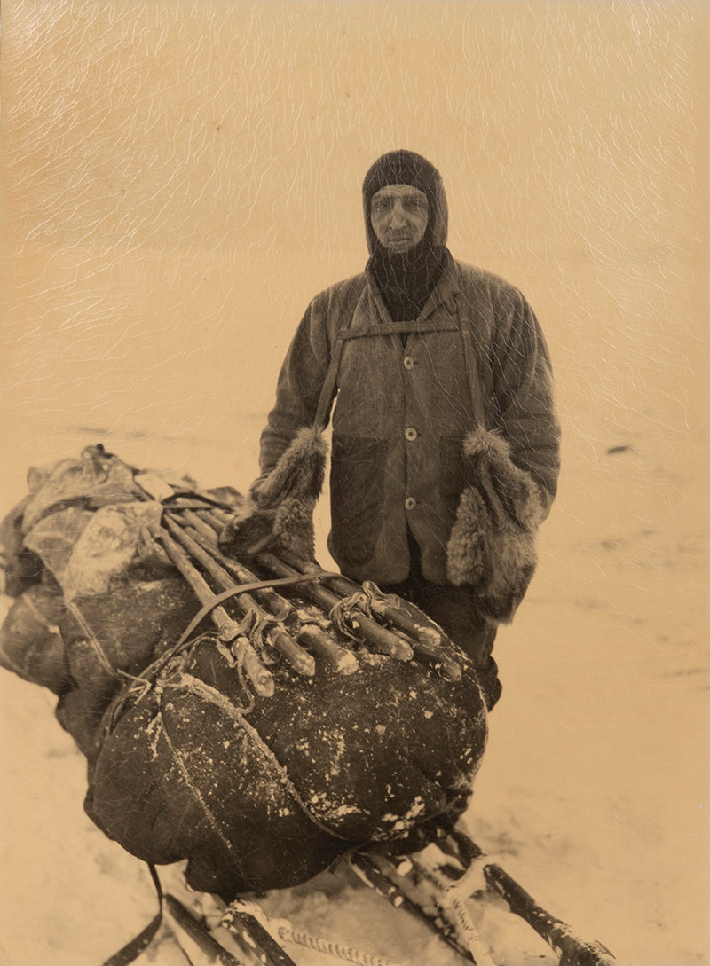 Classic photograph by Herbert Ponting from Captain Scott's Terra Nova expedition showing Capt. H.R. Bowers returning from the Southern journey.