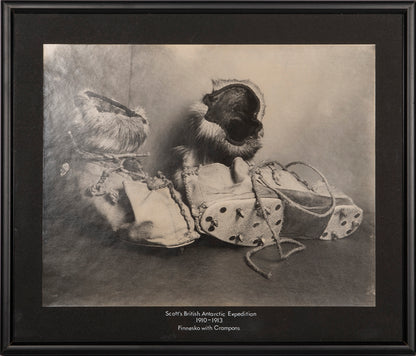 Classic Herbert Ponting photograph from Captain Scott's Terra Nova expedition (1910-1913), showing a pair or reindeer skin boots known as finnesko.