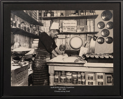 Classic Herbert Ponting photograph from Captain Scott's Terra Nova expedition (1910-1913), whosing Thomas Clissold making bread.