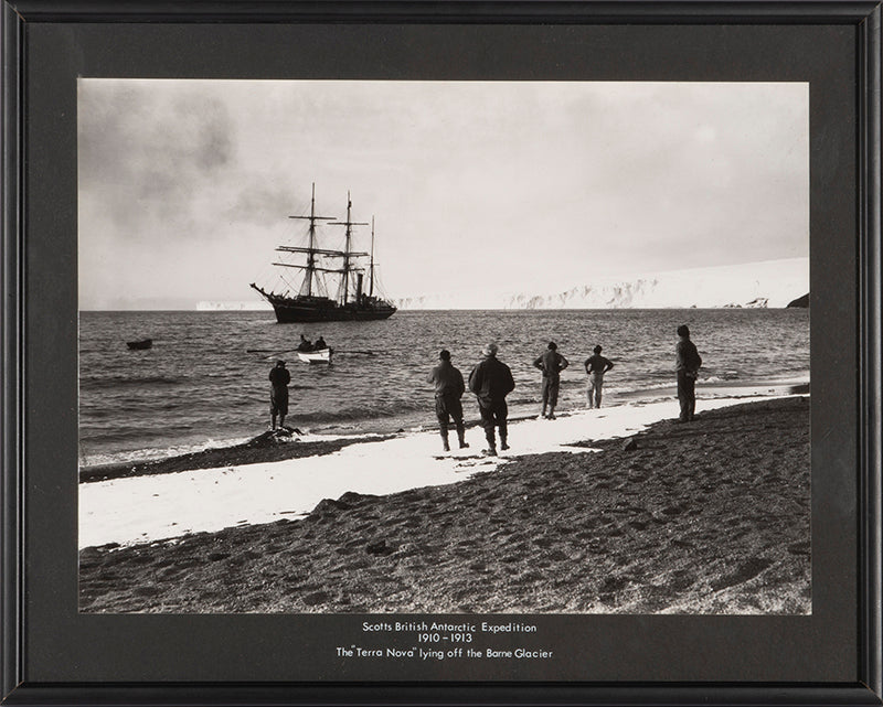 Classic Herbert Ponting photograph from Captain Scott's Terra Nova expedition (1910-1913), showing the Terra Nova lying off the Barne Glacier.