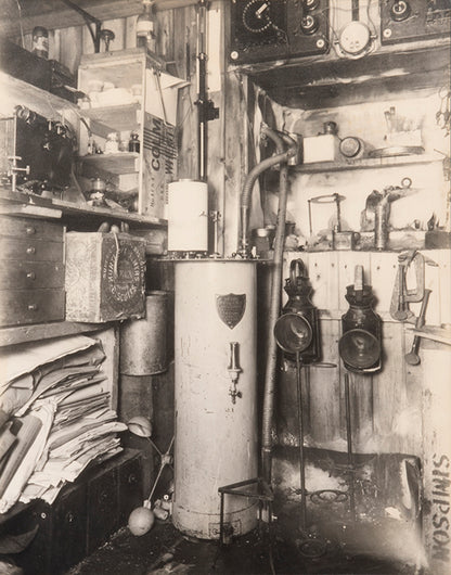 Classic Herbert Ponting photograph from Captain Scott's Terra Nova expedition (1910-1913), showing Dyne's anemomenter in Simpson's laboratory.