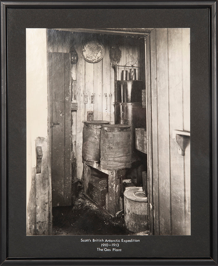 Classic Herbert Ponting photograph from Captain Scott's Terra Nova expedition (1910-1913), showing the plant where acetylene gas was produced.