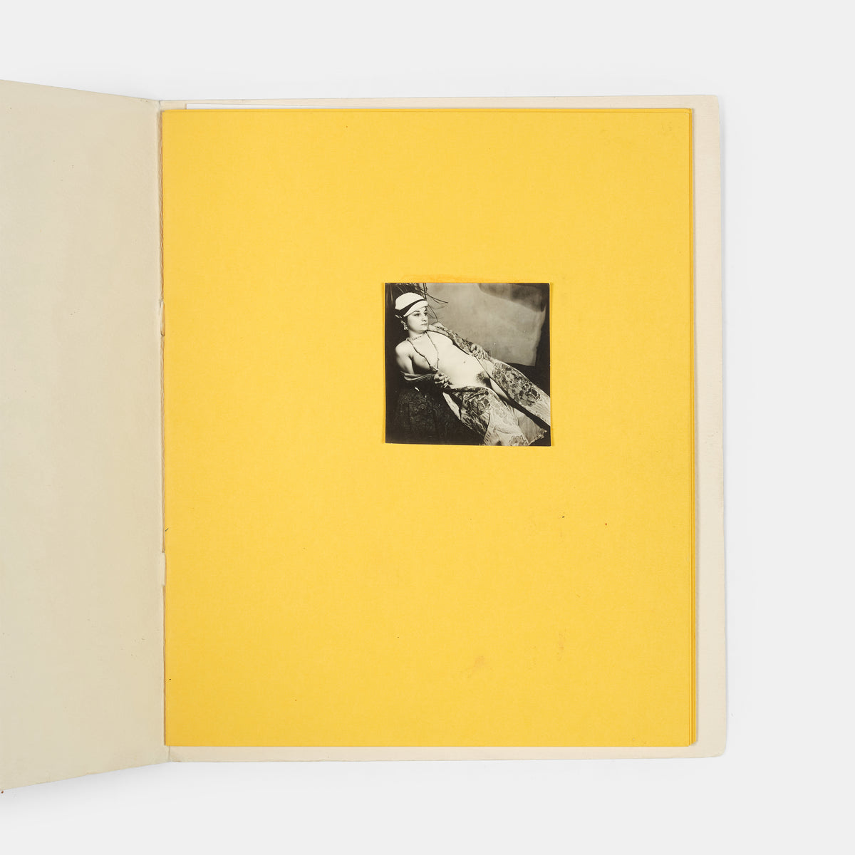 Jack Smith is a key figure in the cultural history of Downtown New York. <em>The Beautiful Book</em> was produced in an intended but unrealised edition of 200 copies, this copy includes an additional image, meaning it contains 20 gelatin silver photographs instead of the usual 19.