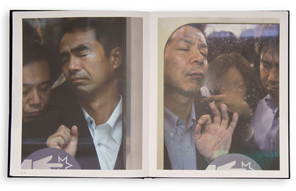 Tokyo Compression comprises Michael Wolf's candid photographs of Japanese commuters in Tokyo's crowded subway cars.