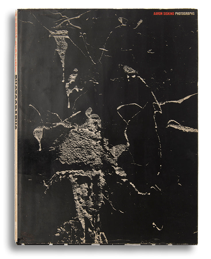 A presentation copy of Aaron Siskind's first monograph, inscribed to antique costumes and textiles dealer Cora Ginsburg.