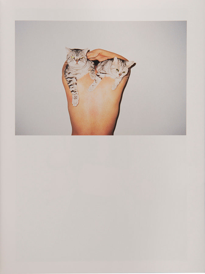 The image on the cover of The Brightest Light Runs Too Fast is only revealed when exposed to temperatures above 27 degrees or by human touch. Otherwise, it remains black, a reference to, and a way to avoid, censorship of such images in China.
