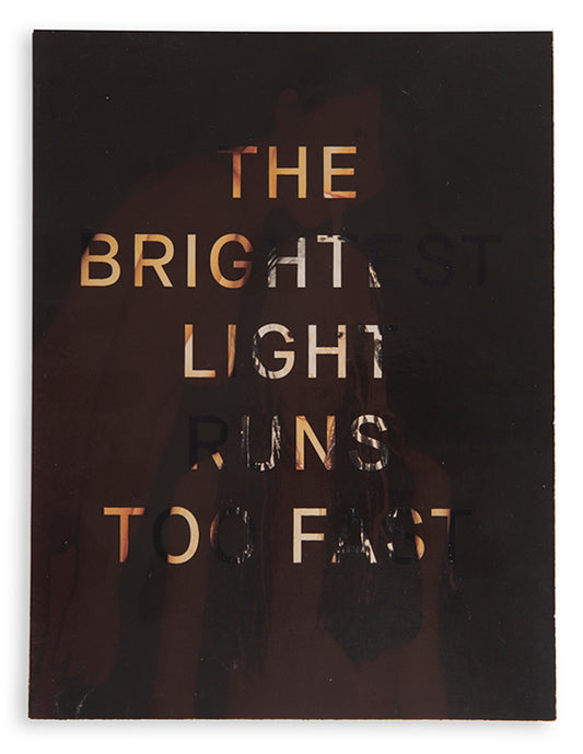 The image on the cover of The Brightest Light Runs Too Fast is only revealed when exposed to temperatures above 27 degrees or by human touch. Otherwise, it remains black, a reference to, and a way to avoid, censorship of such images in China.