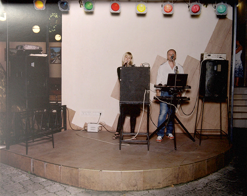 Sochi Singers is the fourth book produced under the auspices of the Sochi Project, a self-financed joint documentary project initiated by photographer Rob Hornstra and writer Arnold van Bruggen.