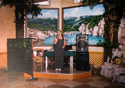 Sochi Singers is the fourth book produced under the auspices of the Sochi Project, a self-financed joint documentary project initiated by photographer Rob Hornstra and writer Arnold van Bruggen.