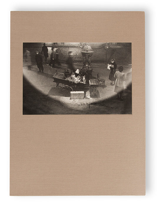 Robert Frank's Flower Is consists of three bodies of work. It begins with photographs taken in Paris of flowers, flower sellers, and chance encounters on the street, continues in a car factory in Detroit, and ends with polaroids made in Mabou Mines, Nova Scotia.