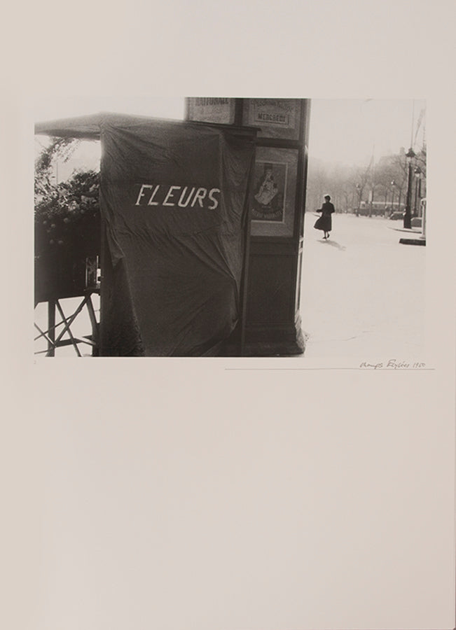 Robert Frank's Flower Is consists of three bodies of work. It begins with photographs taken in Paris of flowers, flower sellers, and chance encounters on the street, continues in a car factory in Detroit, and ends with polaroids made in Mabou Mines, Nova Scotia.