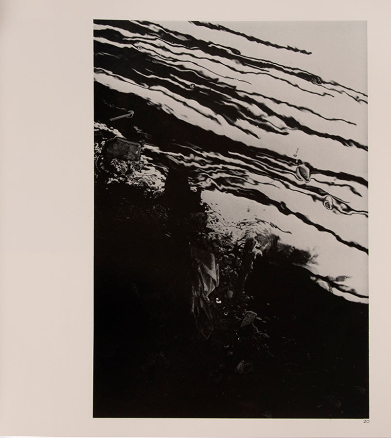 Morinaga Jun's photographs in River, its shadow of shadows of polluted Tokyo rivers foreshadow W. Eugene Smith's decision to document the fallout from polluted waters in Minamata.