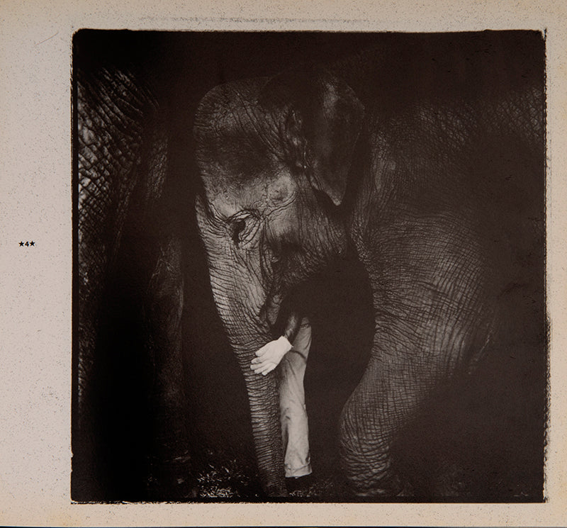 Mind Games is Suzuki Kiyoshi's third book, taking its title from a song by John Lennon. The Japanese title refers to the first chapter, 'People under the Tent,' which contains photographs of a travelling circus troupe that invoked memories for Suzuki of his childhood. 