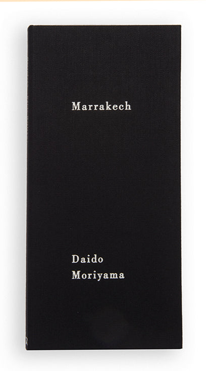In 1989, Moriyama Daido spent some time in a rented apartment in Paris when a Tokyo gallery owner suggested he travel to Morocco. Marrakech comprises two books bound one above the other; this allows the viewer to assemble different combinations of images as the pages are turned.