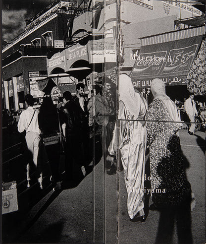 In 1989, Moriyama Daido spent some time in a rented apartment in Paris when a Tokyo gallery owner suggested he travel to Morocco. Marrakech comprises two books bound one above the other; this allows the viewer to assemble different combinations of images as the pages are turned.