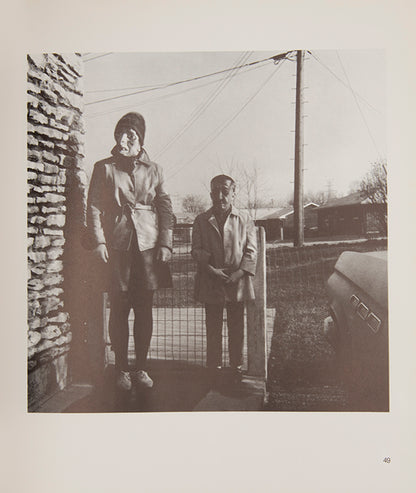This is Ralph Eugene Meatyard's best-known work, for which he cast his wife Madelyn as the mask-wearing central character Lucybelle Crater, a name adapted from a character in a Flannery O'Connor short story.