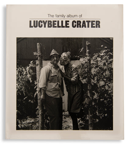 This is Ralph Eugene Meatyard's best-known work, for which he cast his wife Madelyn as the mask-wearing central character Lucybelle Crater, a name adapted from a character in a Flannery O'Connor short story.